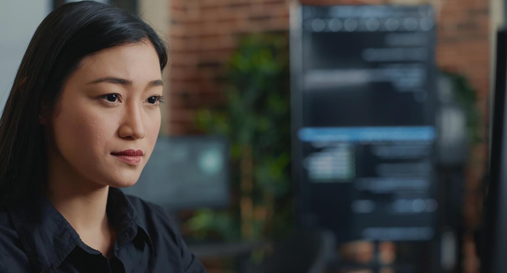 Students working collaboratively on game development projects in a modern learning environment