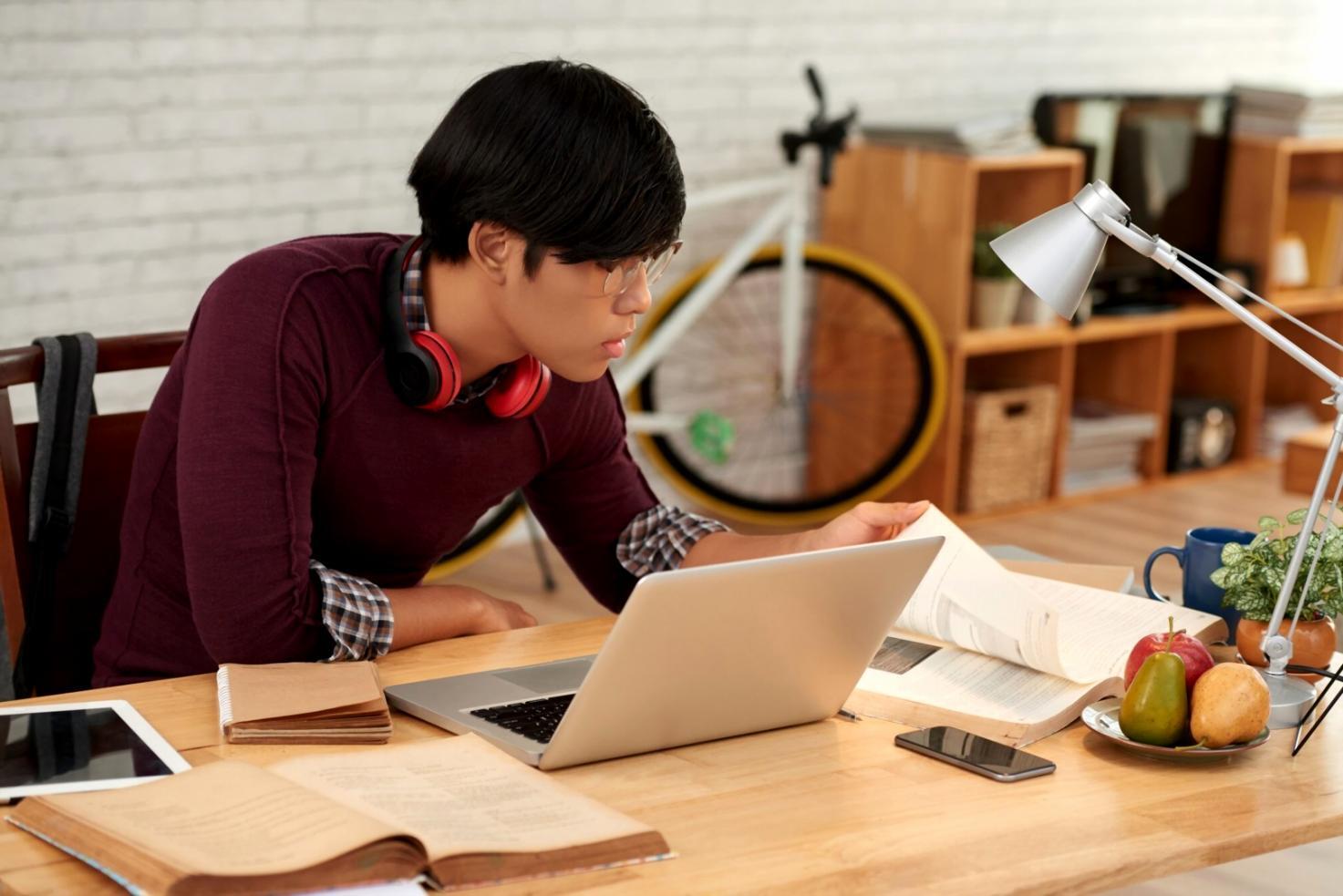 Programming workspace with game development tools and educational materials